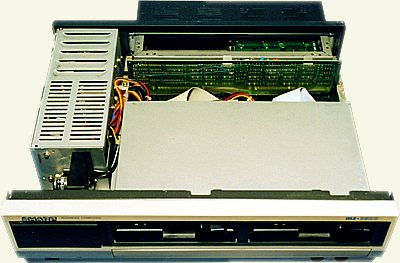 MZ-3541 opened. Power supply, MFD interface, floppies ( covered ) 